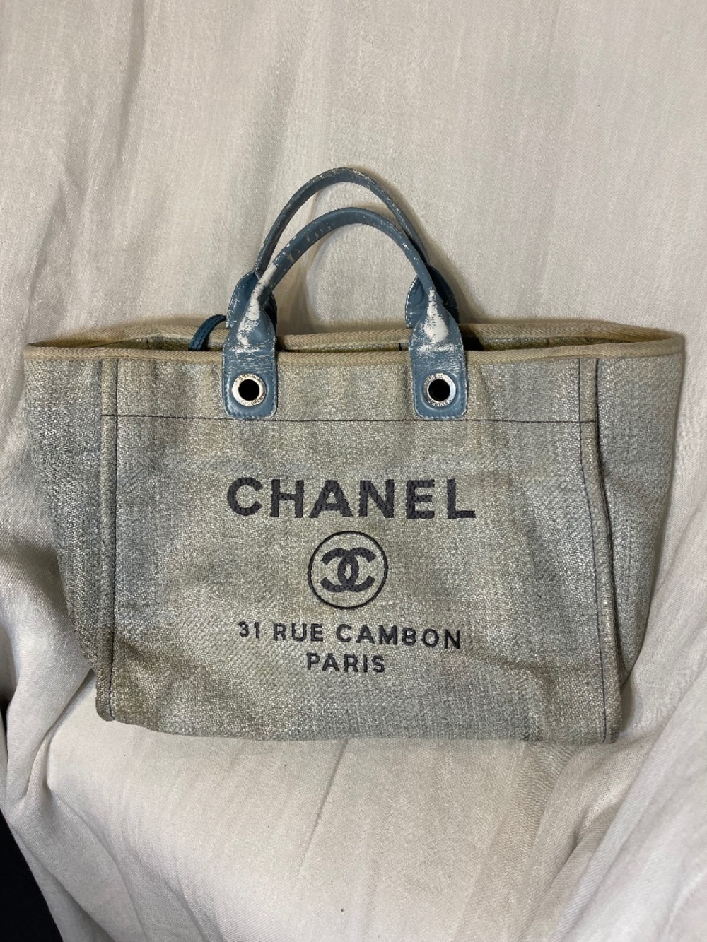CHANEL Beige Canvas Tote with Blue Handles